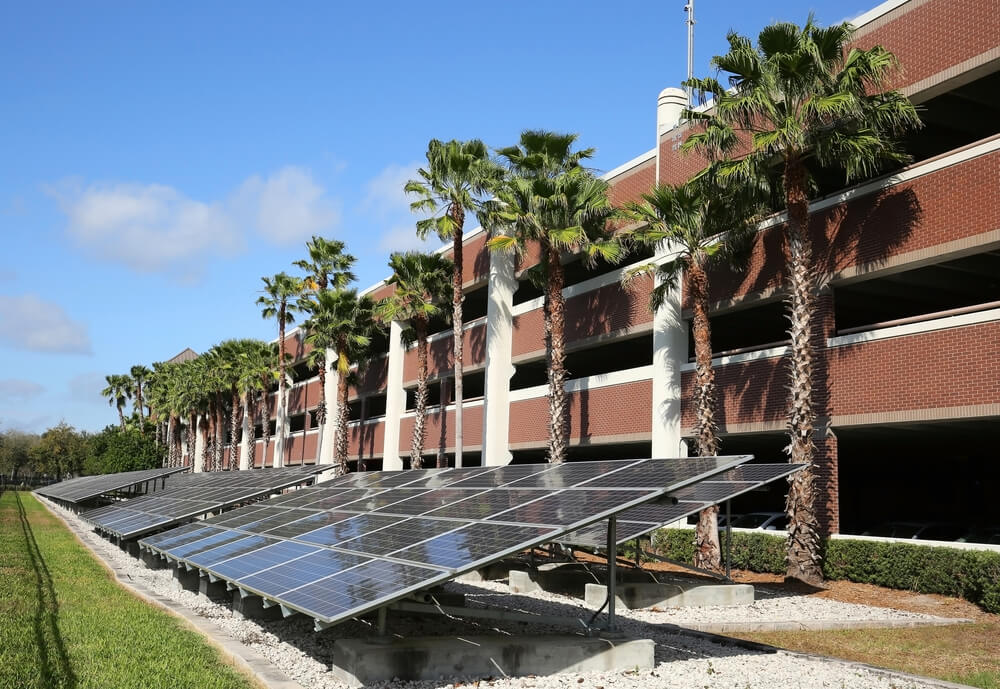 Long line of solar panels converting the sun's rays into electricity