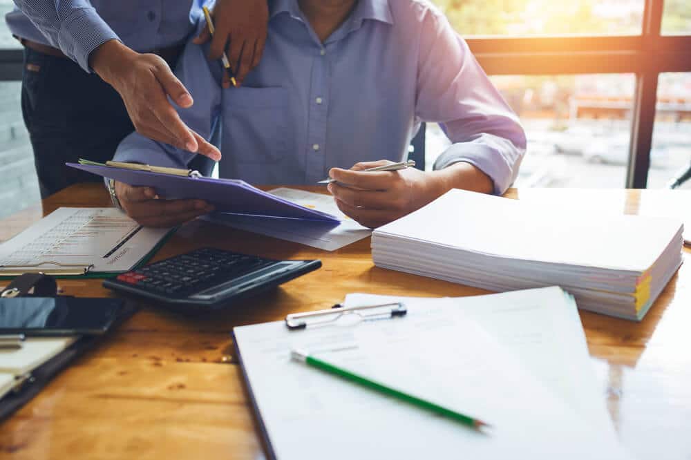 Accountant working on accounting financial report of annual